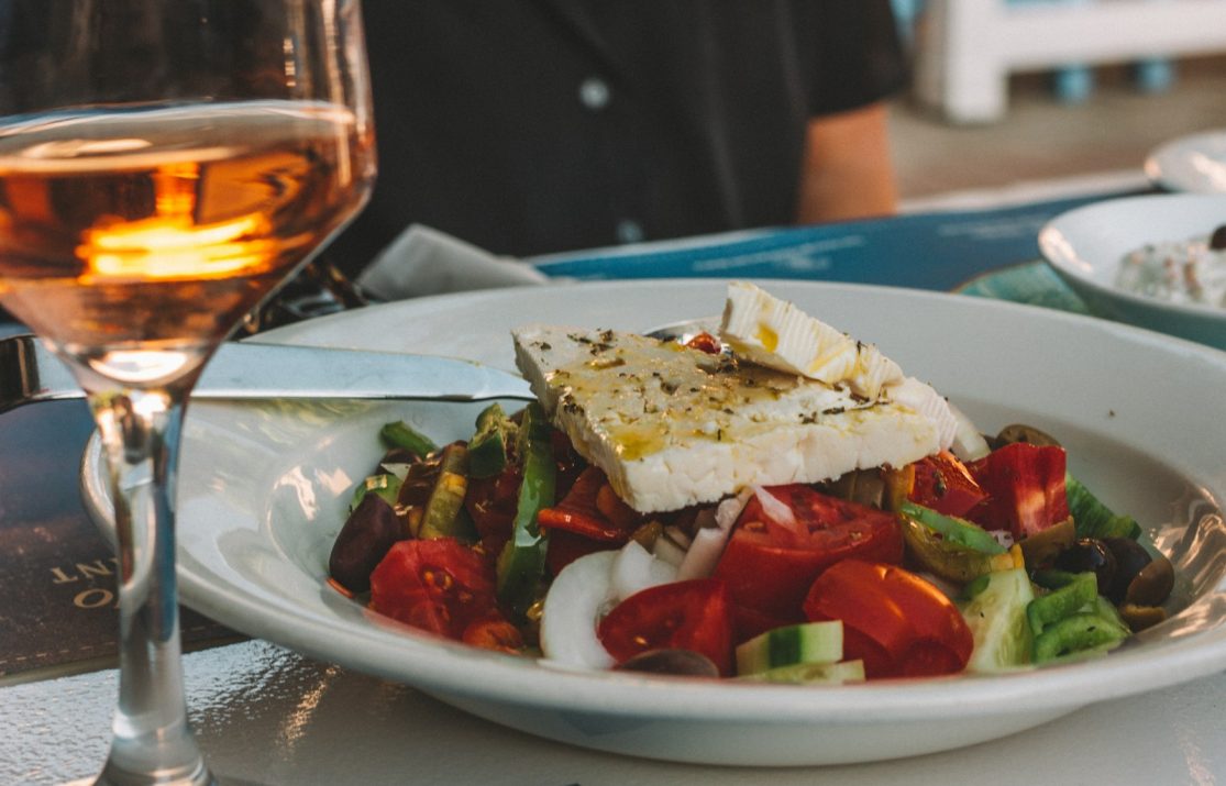 sliced tomato and cucumber on white ceramic plate